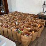 House of Neighborly Service preparing food for the Summer Lunch Program