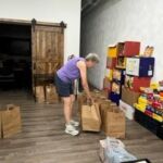 House of Neighborly Service preparing food for the Summer Lunch Program