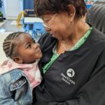 Nana Pat with all of her sass and personality will melt as soon as little "Juicy Fruit" (as she affectionately calls her) comes her way. She has become the loving champion in her corner that each child needs, and this special intergenerational relationship helps them both thrive each day.