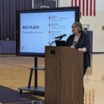 Outreach Associate, Megan H., presenting on Teen Dating Violence at Valmeyer High School.